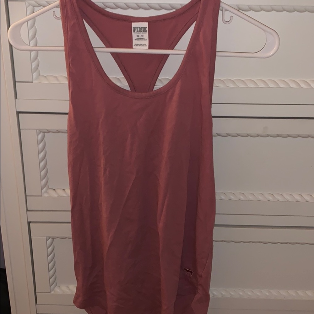 Burgundy tank top with a cross in the back